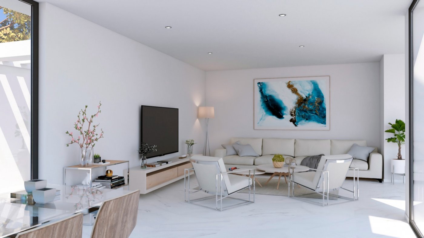 Interior render of a living room with sofa, TV unit and abstract artwork above the couch