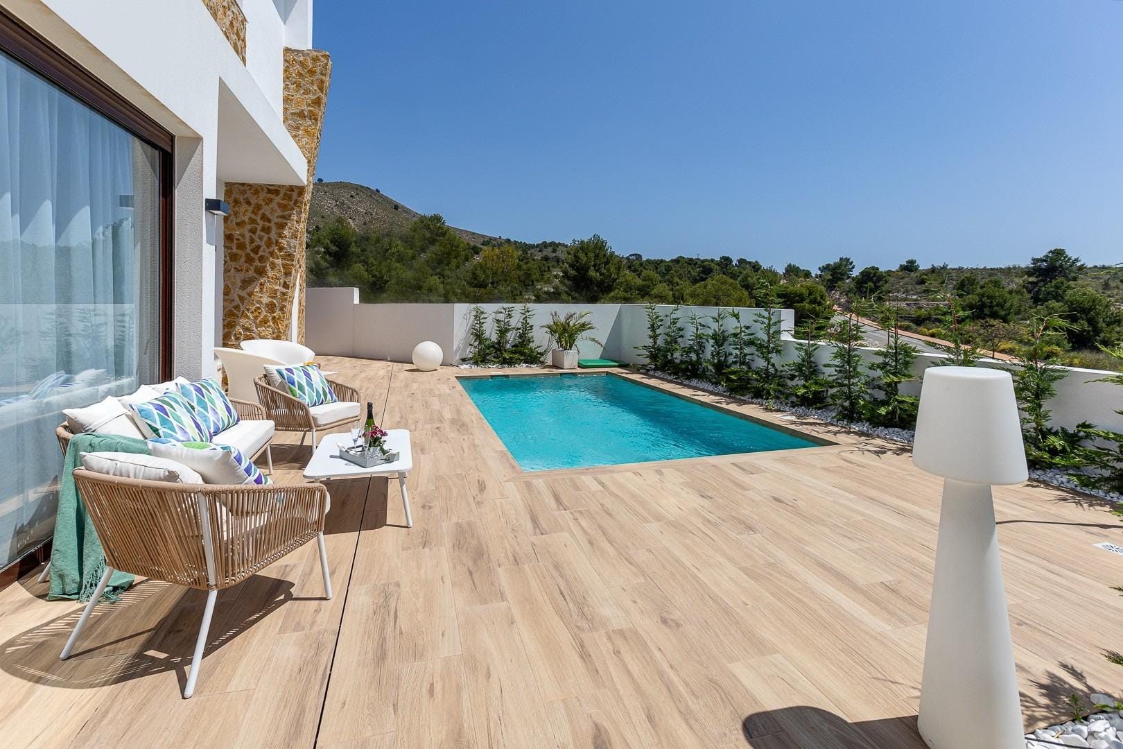 Pool and sunny terrace beside the villa in Balcón de Finestrat, Alicante