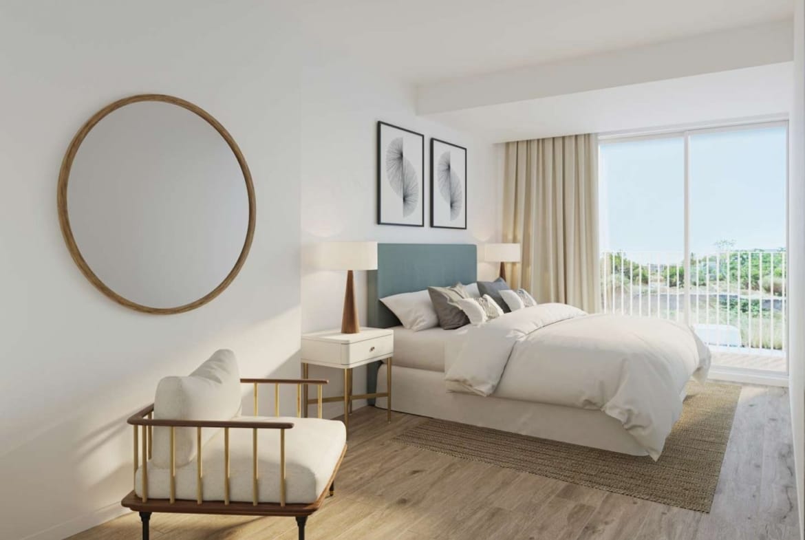 Wide rendering of a double bedroom with a timber armchair and glazed doors in Jávea, Alicante