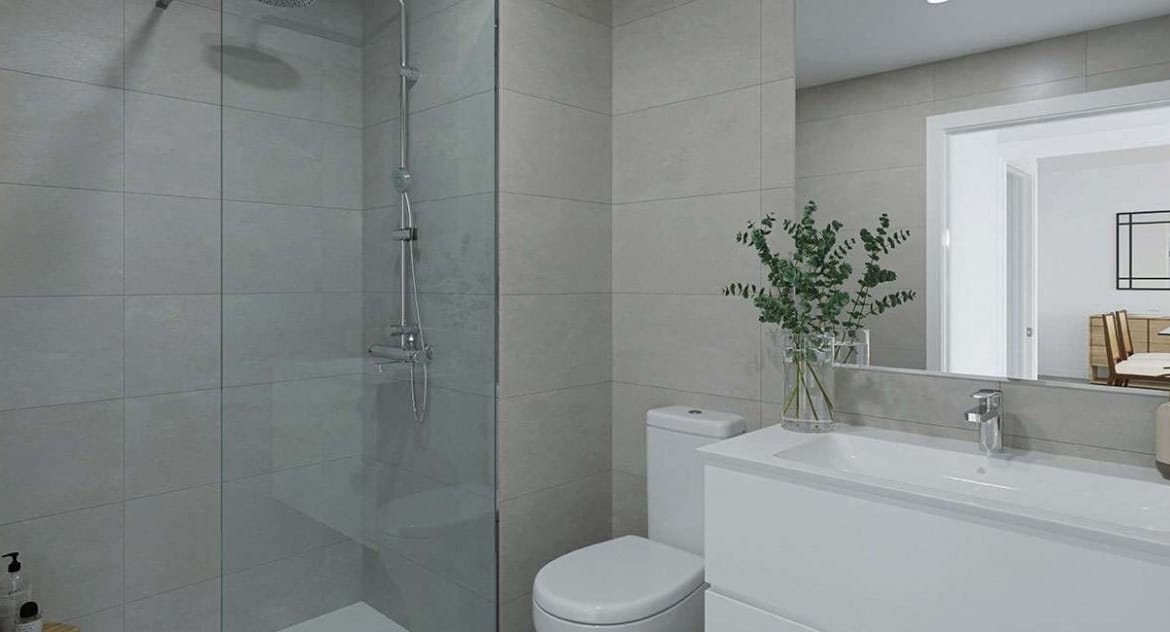 Rendering of a grey-tiled bathroom with walk-in shower and vanity unit in Jávea, Alicante