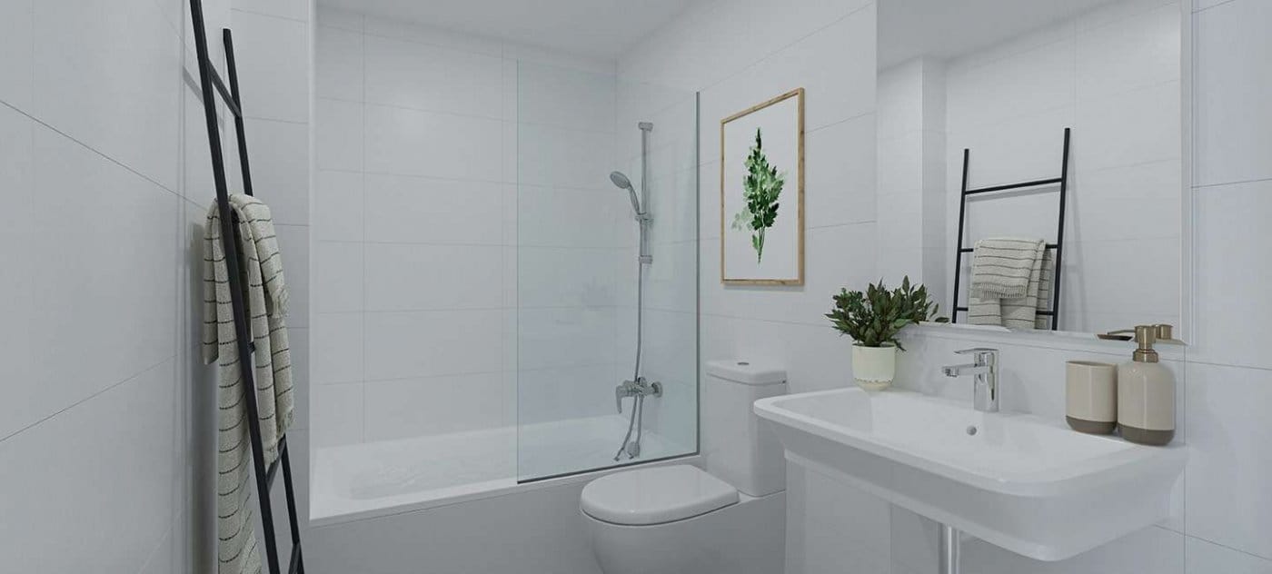 Rendering of a bathroom with bathtub, white washbasin and framed wall prints in Jávea, Alicante