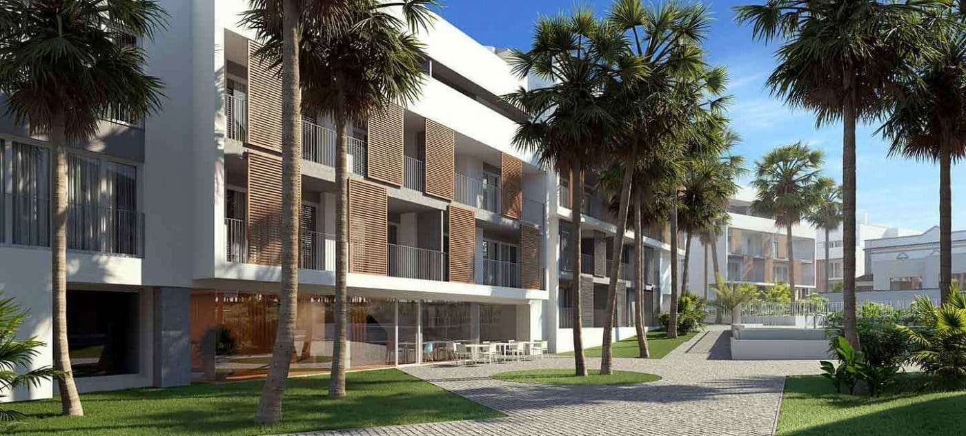Rendering of the apartment buildings, palm-lined paths and communal gardens in Jávea, Alicante