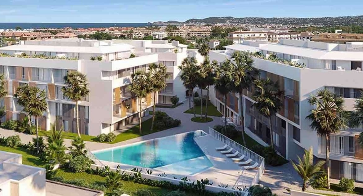Aerial rendering of the apartment development with communal pool, landscaped gardens and coastal surroundings in Jávea, Alicante