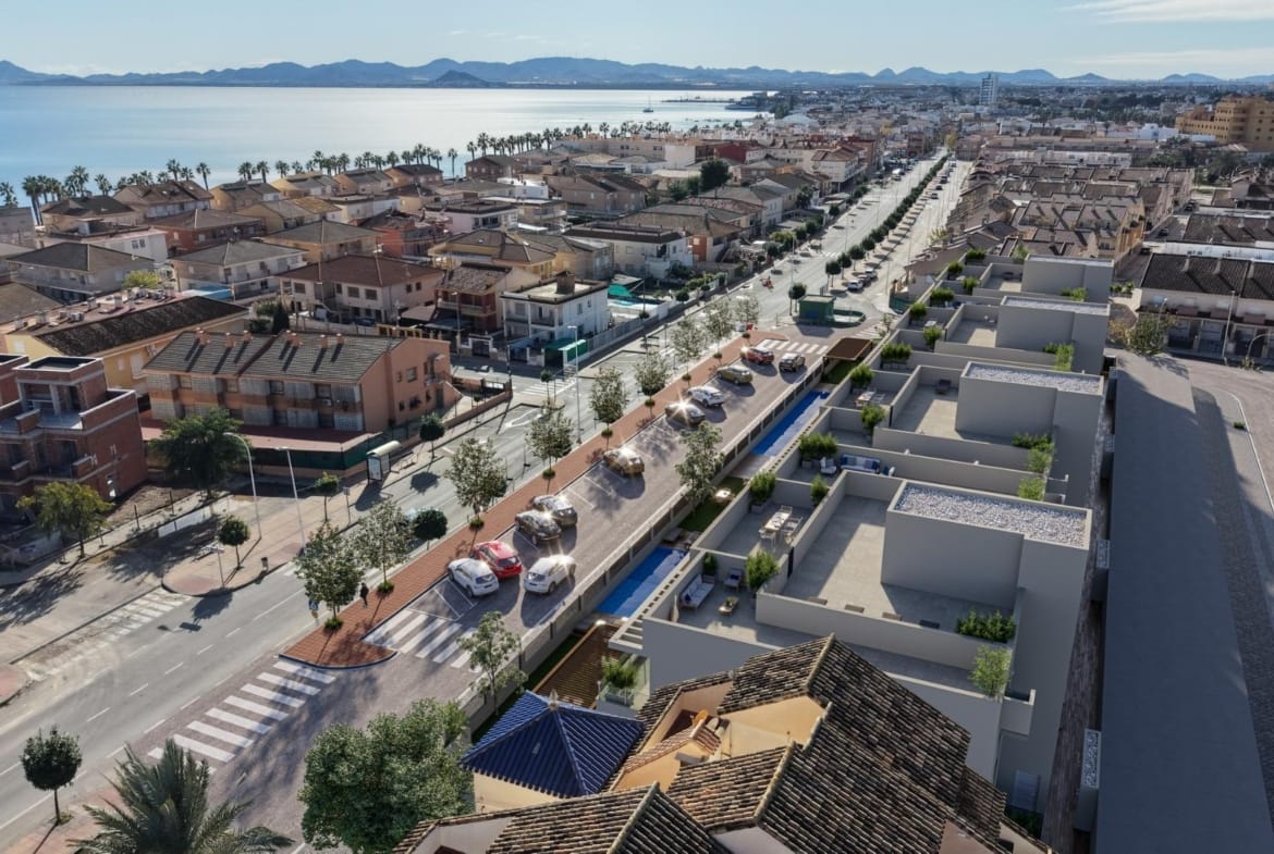 Aerial view of the apartment buildings beside the surrounding streets and the Mar Menor in Los Narejos, Murcia