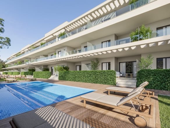 Apartment facade with broad terraces overlooking a communal swimming pool and sun deck in Los Narejos, Murcia