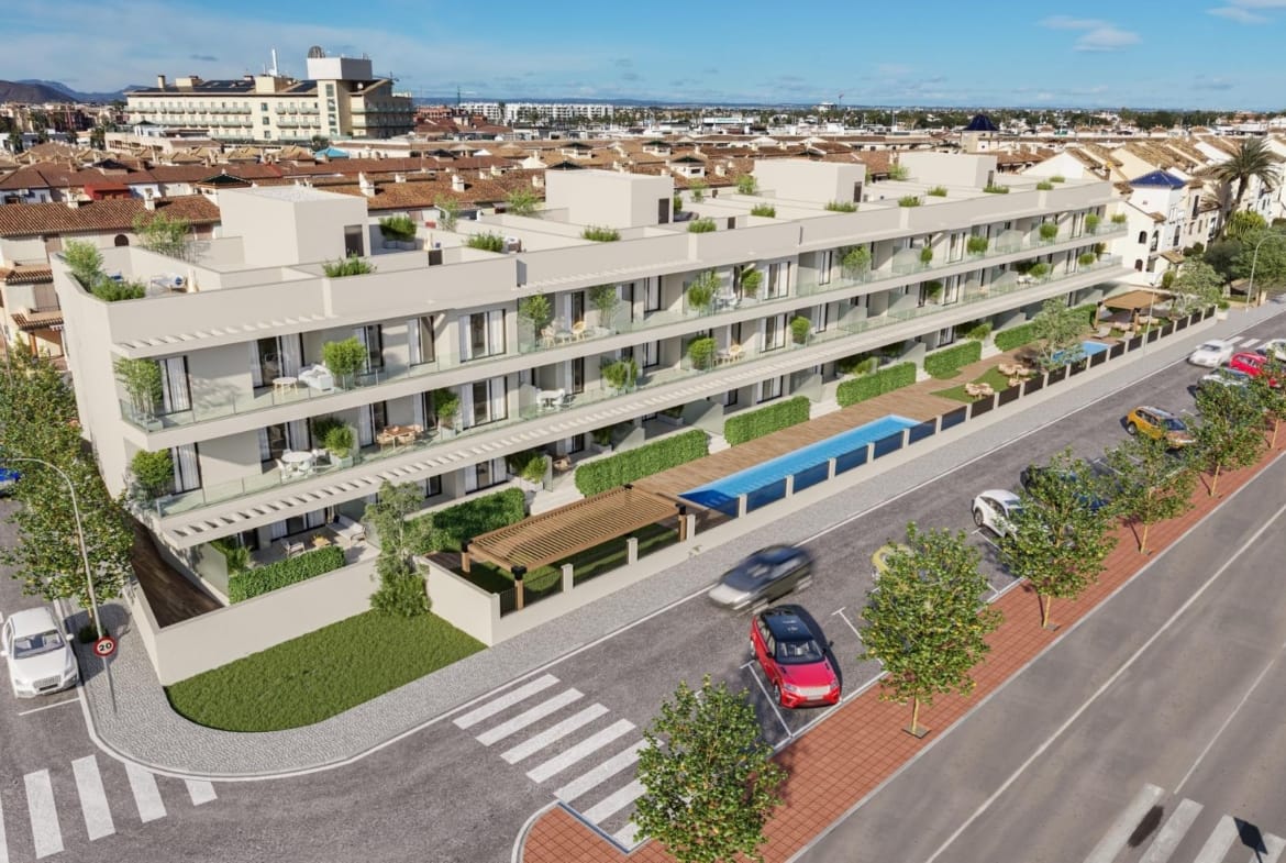 Corner aerial view of the apartment buildings, terraces, communal pools and surrounding streets in Los Narejos, Murcia