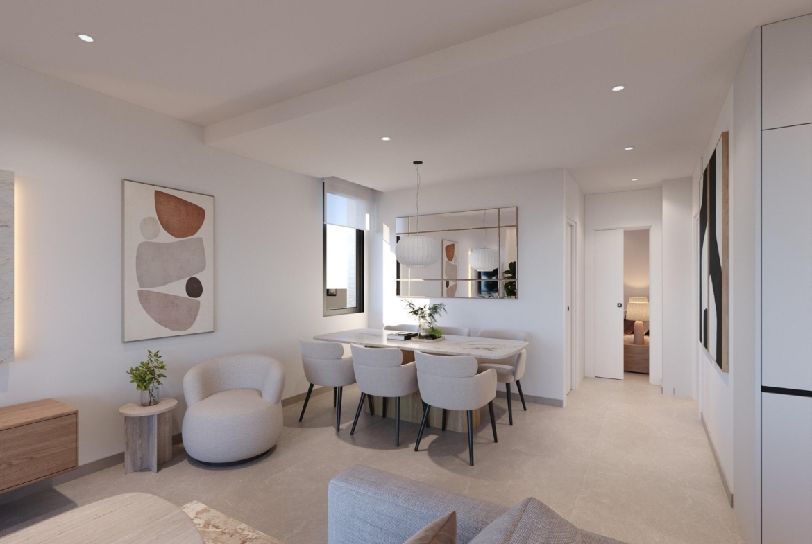 Dining table with pendant lights, wall mirror and hallway leading to a bedroom doorway