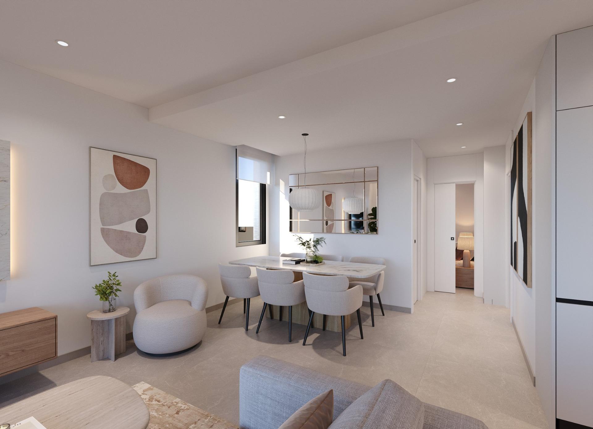 Dining table with pendant lights, wall mirror and hallway leading to a bedroom doorway