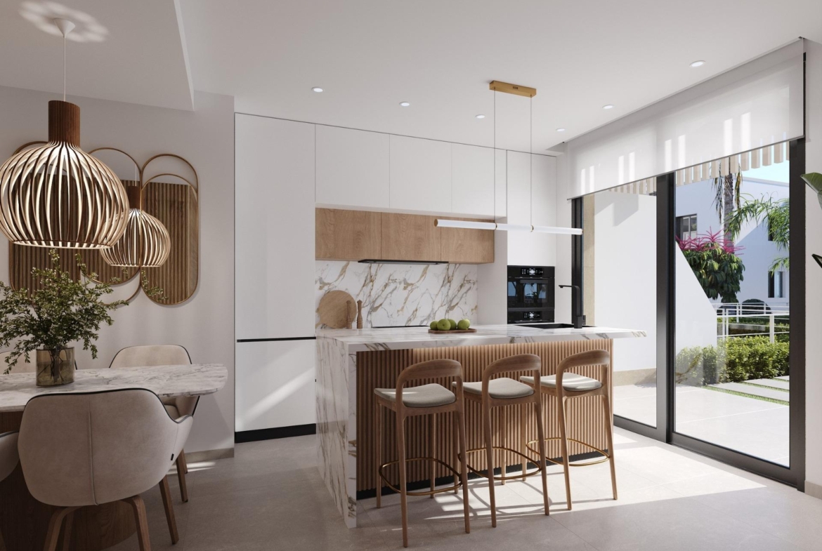 Kitchen and dining area with marble island, three stools and sliding doors