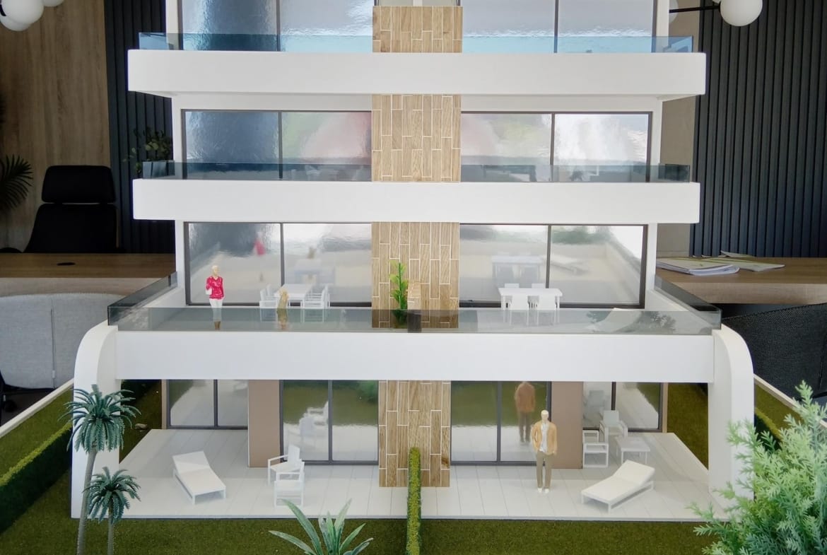 Scale model of the apartment building with terraces on each level