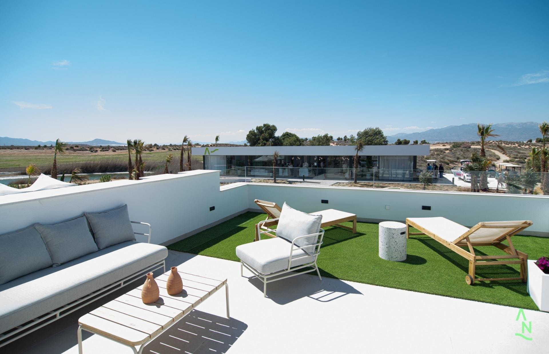 Spacious rooftop terrace with loungers and open views