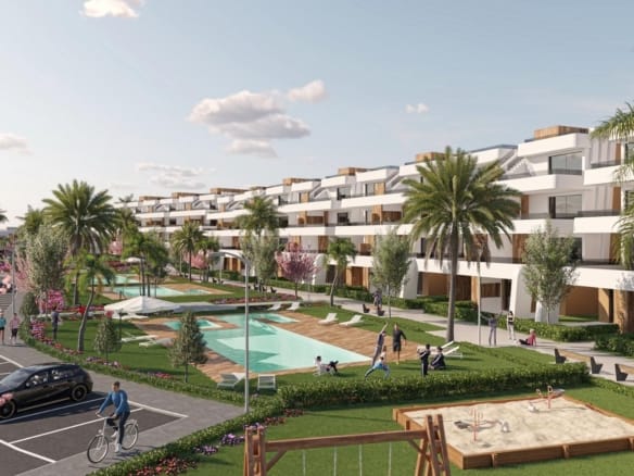 Landscaped communal pool area with apartment buildings, gardens and parking