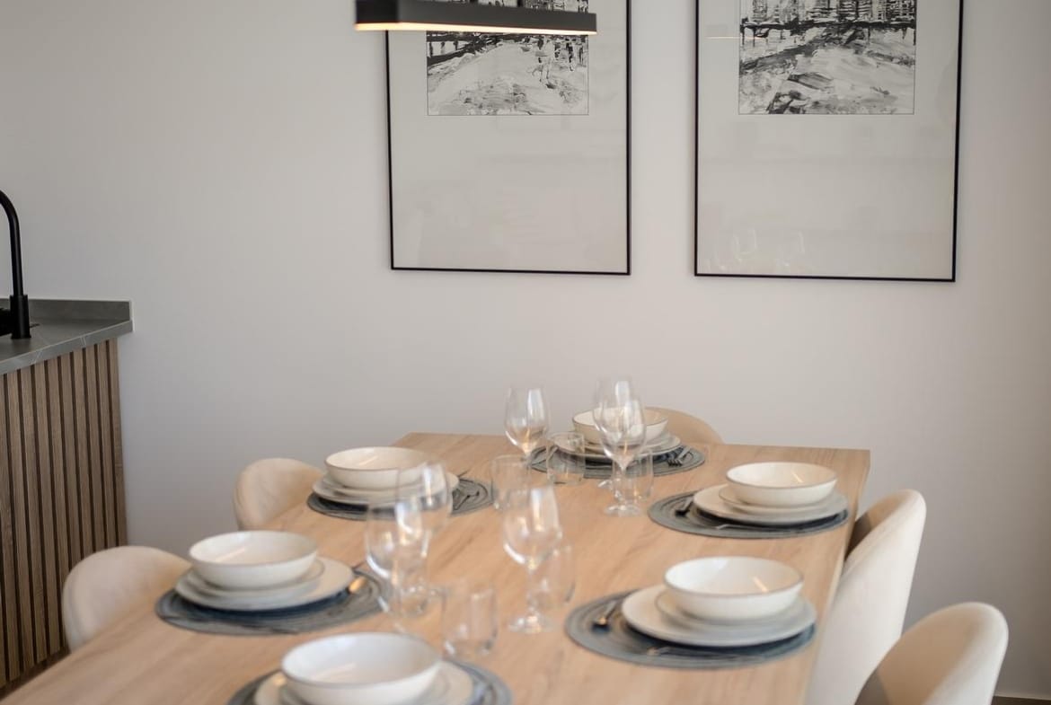 Dining area beside the kitchen in a Condado de Alhama apartment