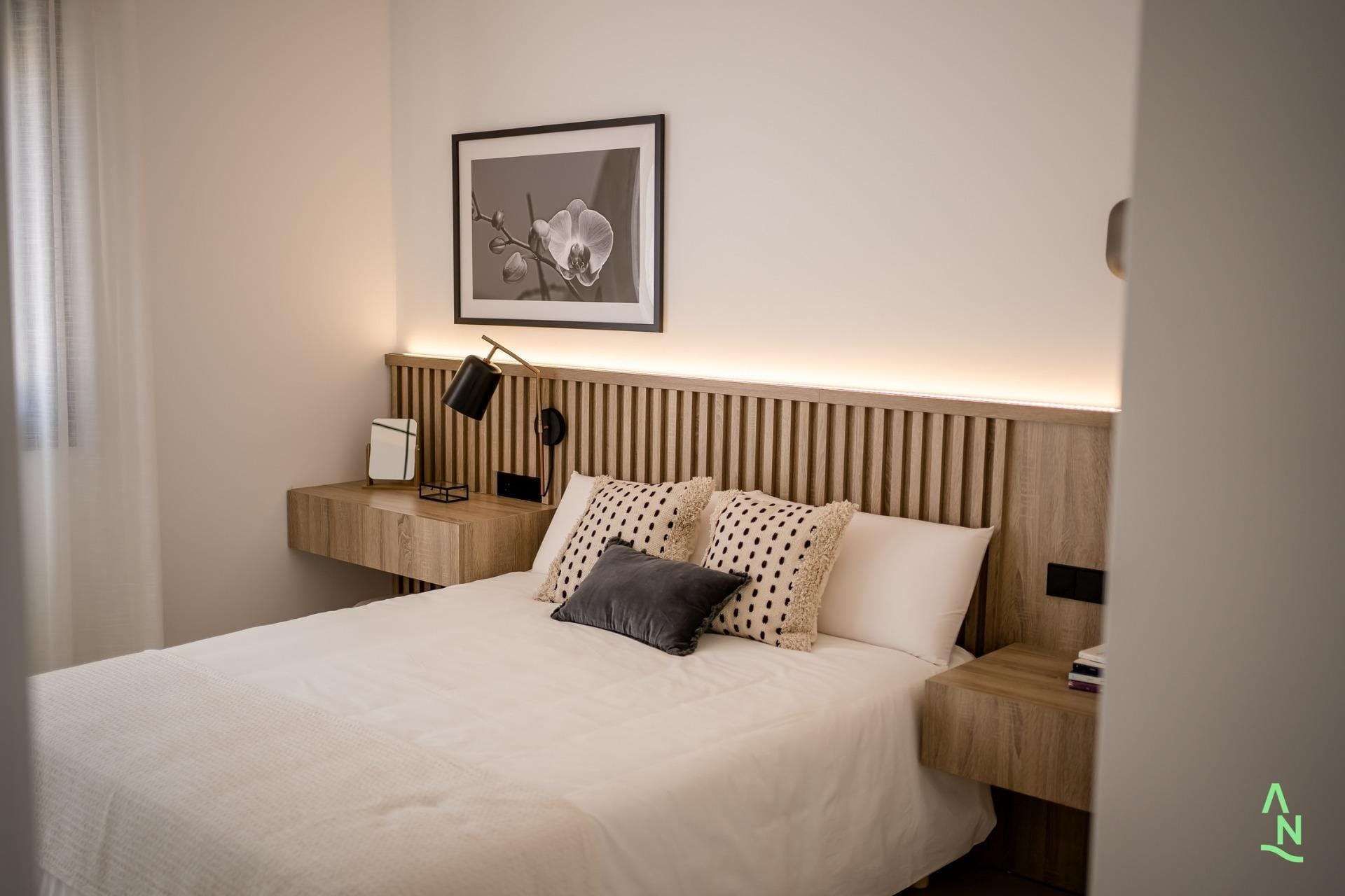 New-Build-Apartments-at-Condado-de-Alhama-Golf-Resort-Murcia-6 Bedroom with double bed and warm wood finishes