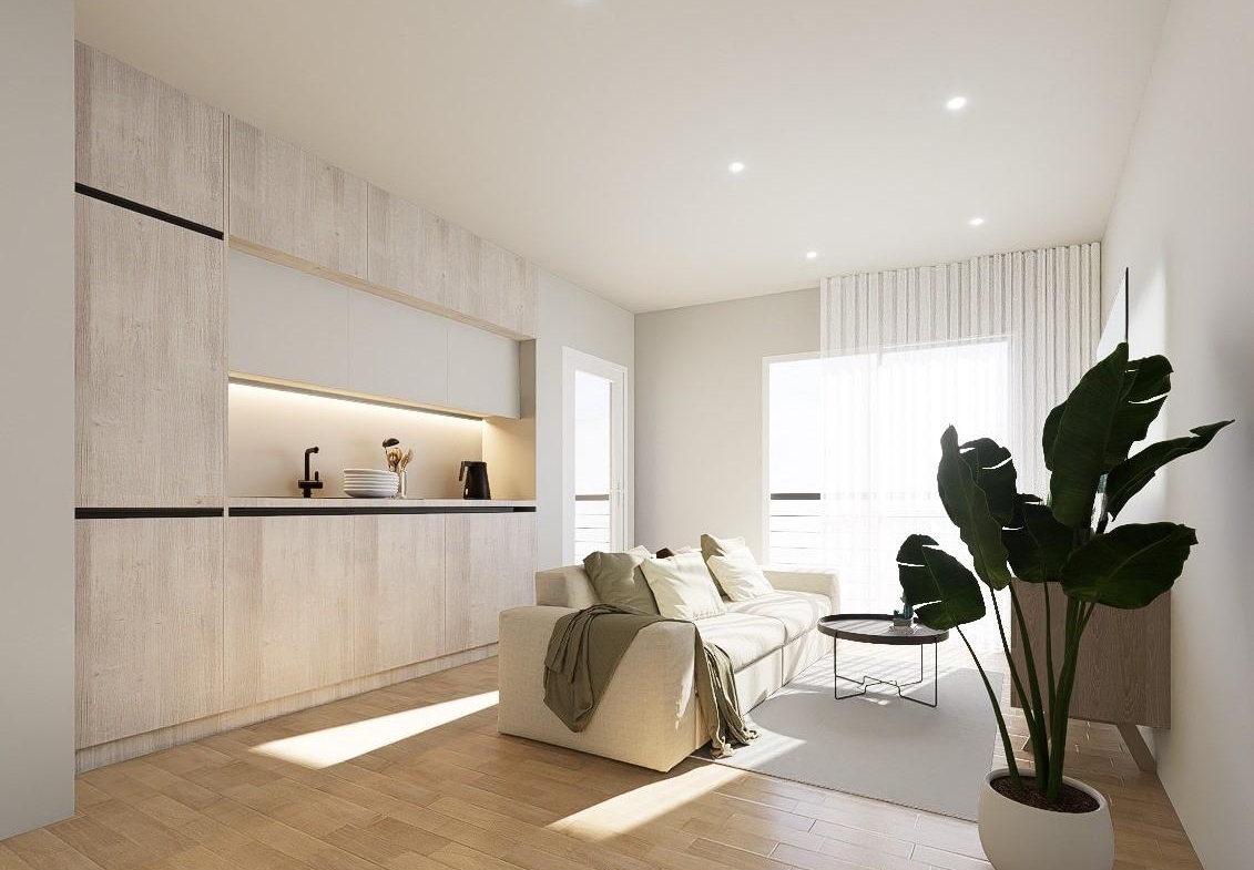 Compact lounge and fitted kitchen with balcony door in a new build Torrevieja penthouse CGI