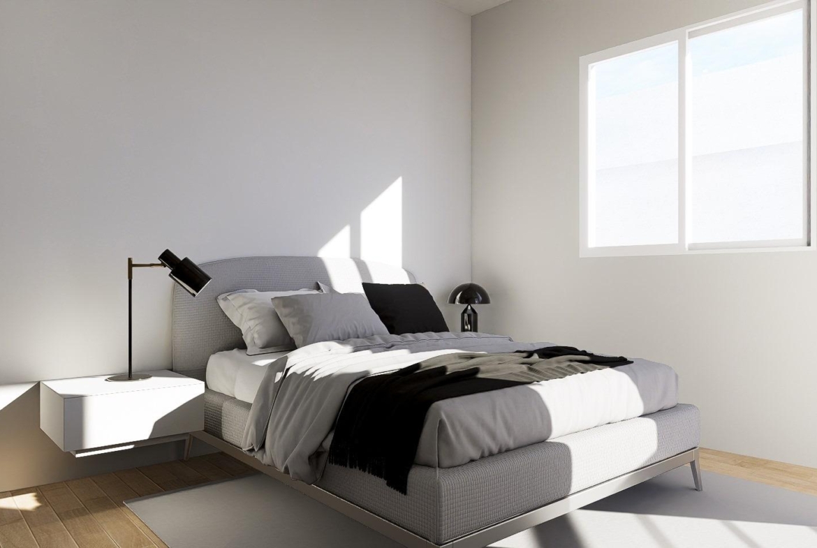 New-Build-Apartments-in-the-Centre-of-Torrevieja-Near-Playa-del-Cura-20 Sunlit double bedroom with bedside units in a new build apartment interior render