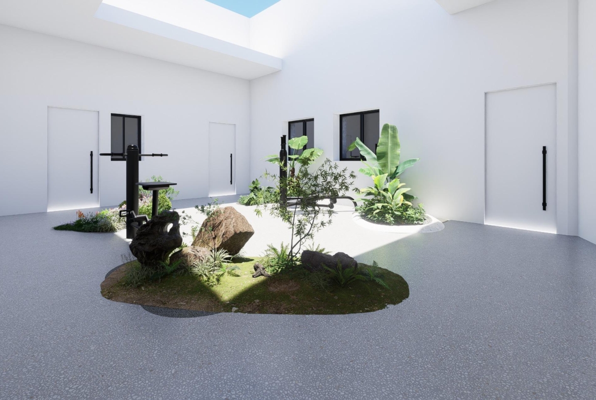 New-Build-Apartments-in-the-Centre-of-Torrevieja-Near-Playa-del-Cura-5 Light-filled internal courtyard with planted islands and outdoor gym equipment in the development