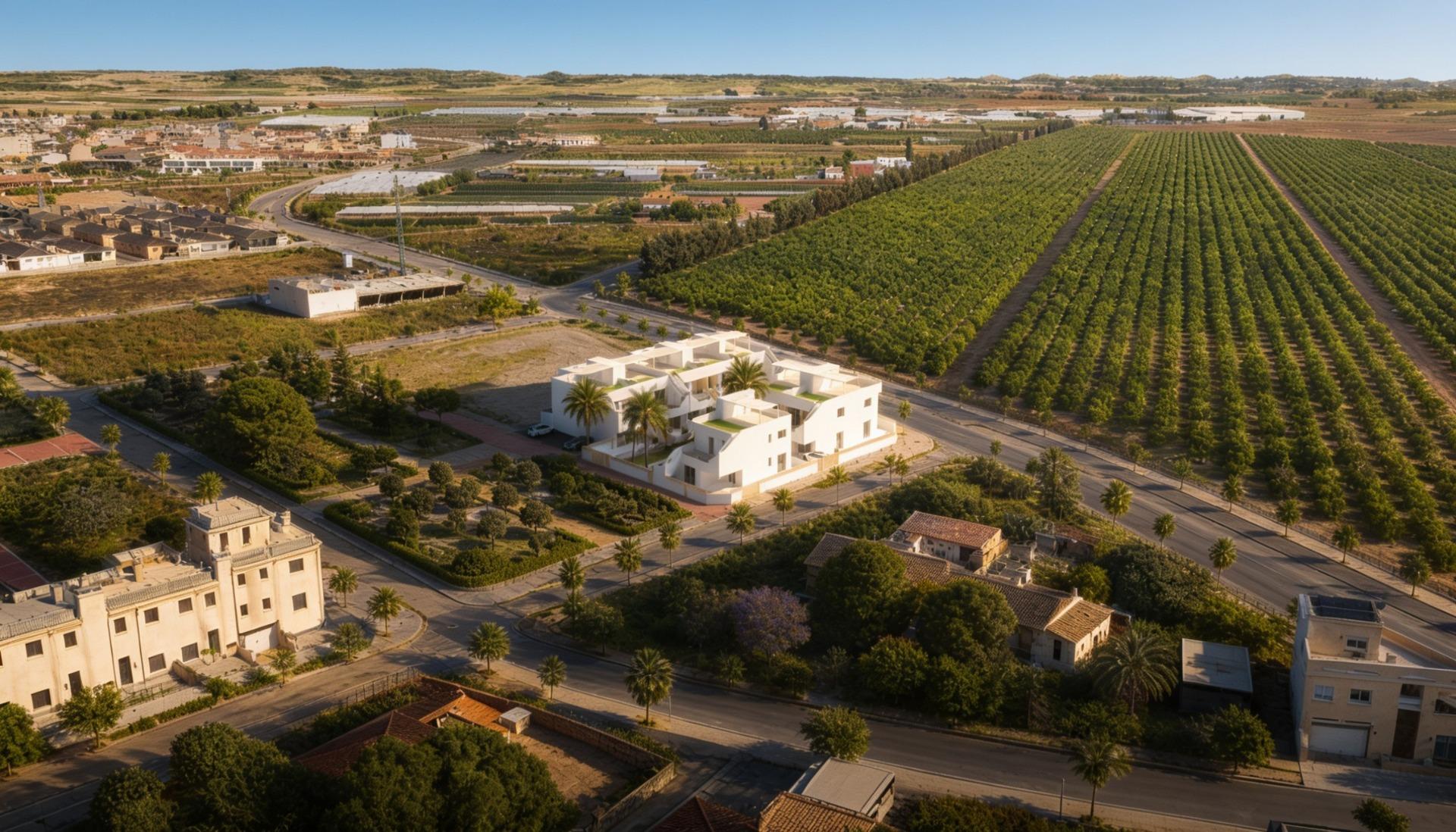 Aerial view showing the apartment cluster beside agricultural fields and surrounding roads