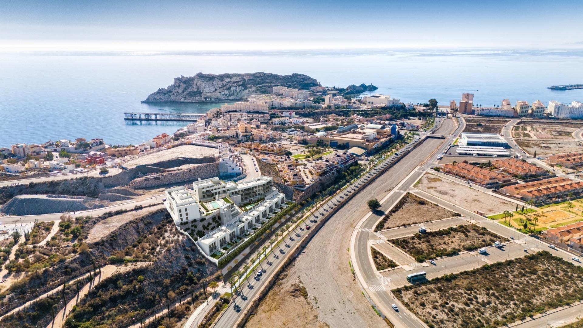 New-Build-Detached-Villas-for-Sale-in-Aguilas-Murcia-Just-500-m-from-the-Beach-5 Aerial view of the hillside coastal area with Los Jardines site highlighted in Águilas