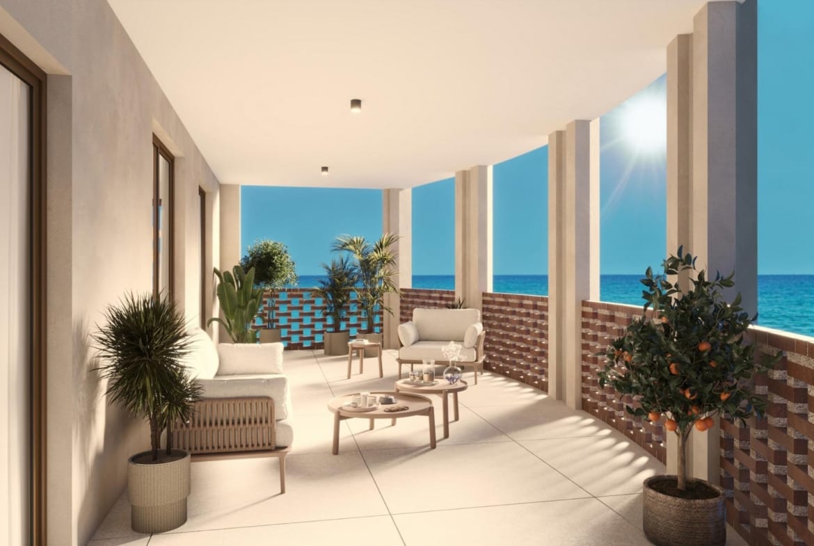 Covered terrace with lounge seating and sea views