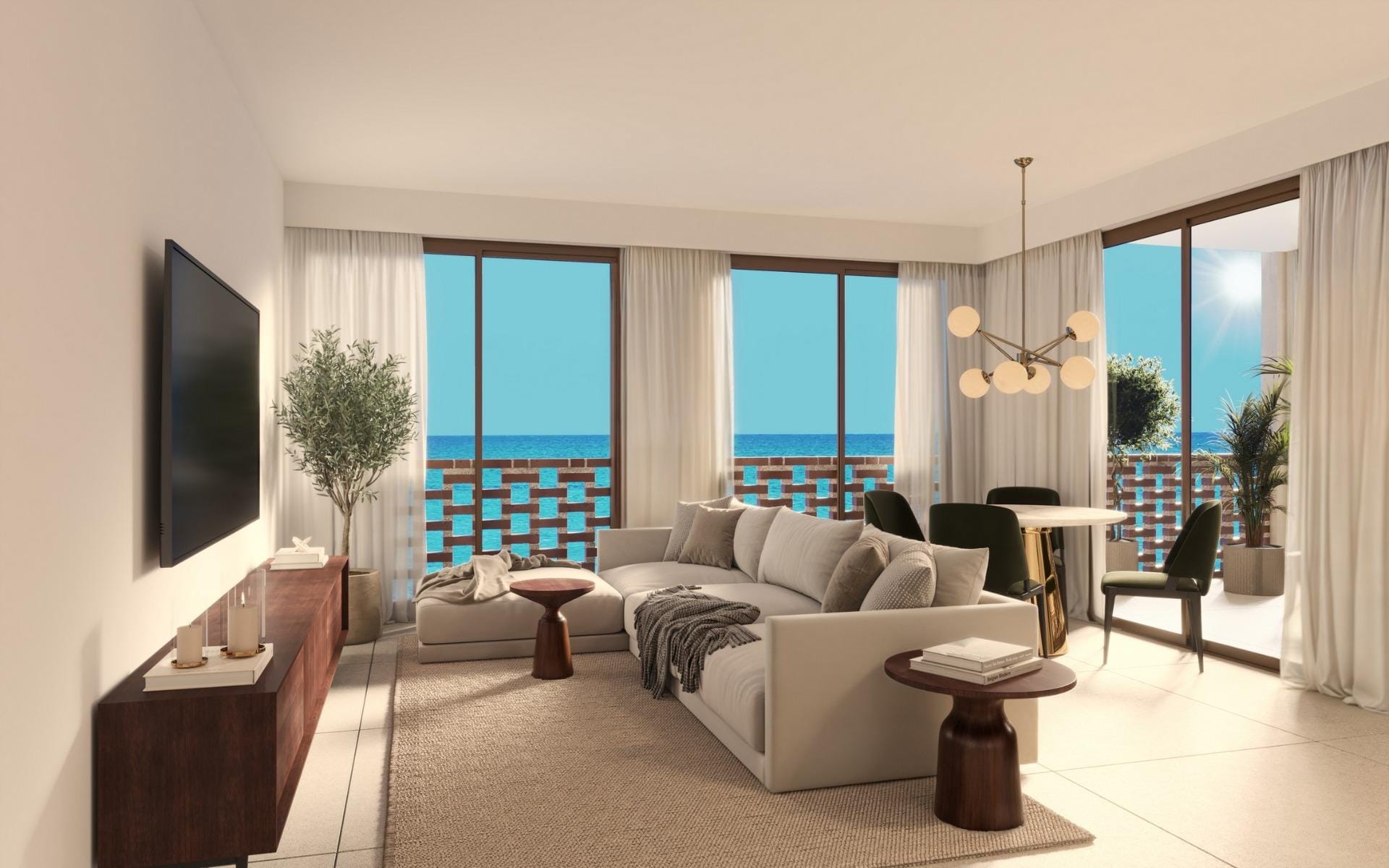 Bright living and dining area with large windows and sea views
