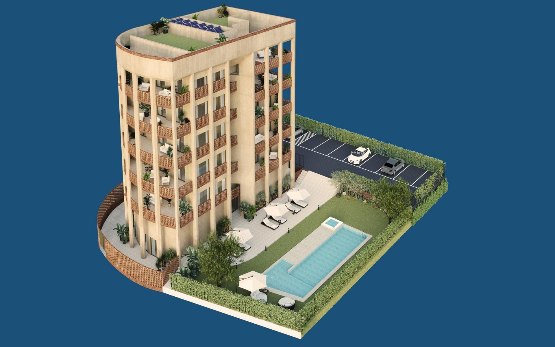 Aerial view of the building with pool, gardens and parking area