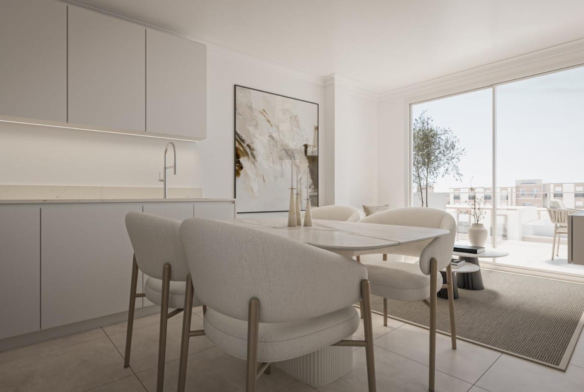 A kitchen and dining area opening onto a terrace in Torrevieja, Alicante