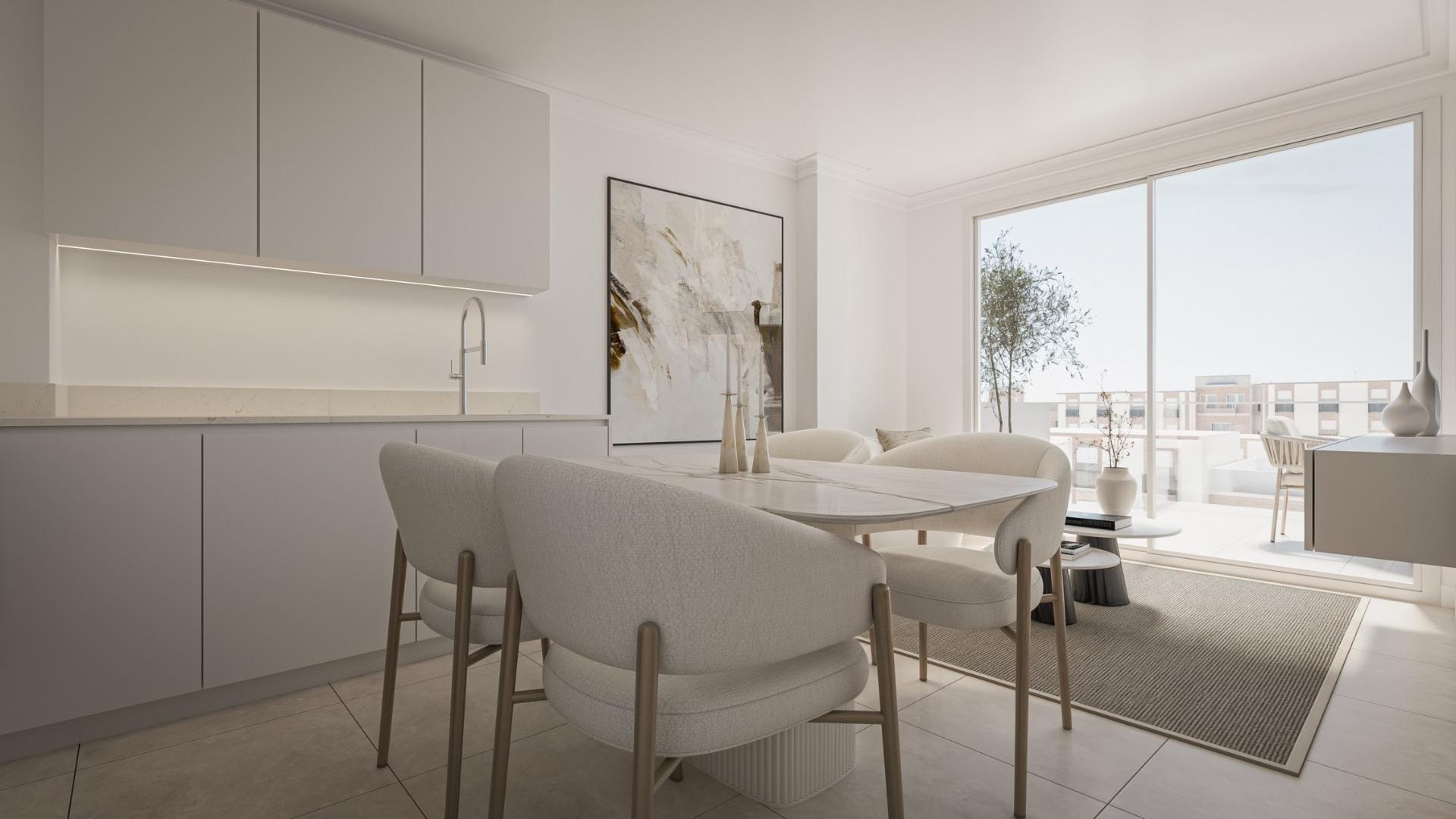 A kitchen and dining area opening onto a terrace in Torrevieja, Alicante