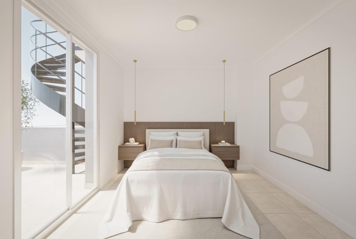 A bedroom with sliding doors to a terrace in Torrevieja, Alicante