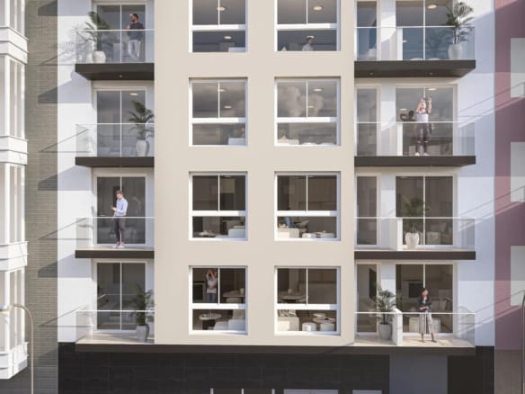 The apartment building facade and balconies in daylight in Torrevieja, Alicante