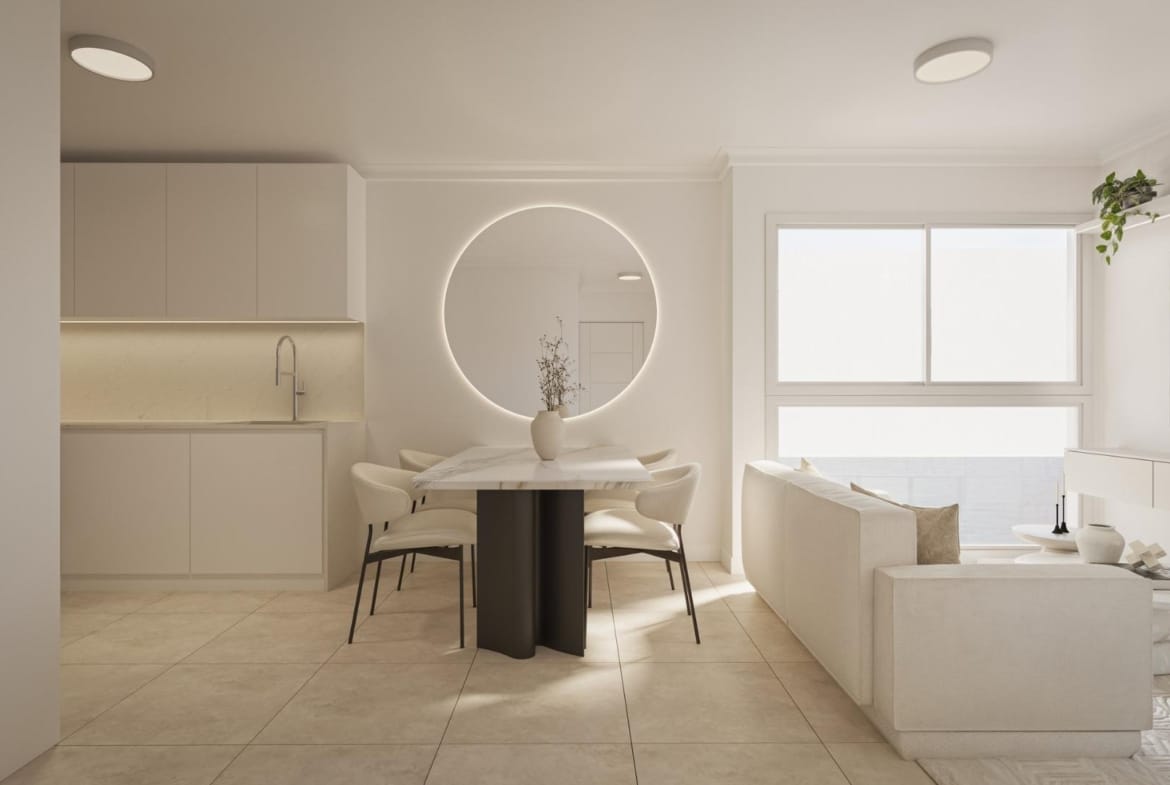 A studio living and dining area beside a large window in Torrevieja, Alicante
