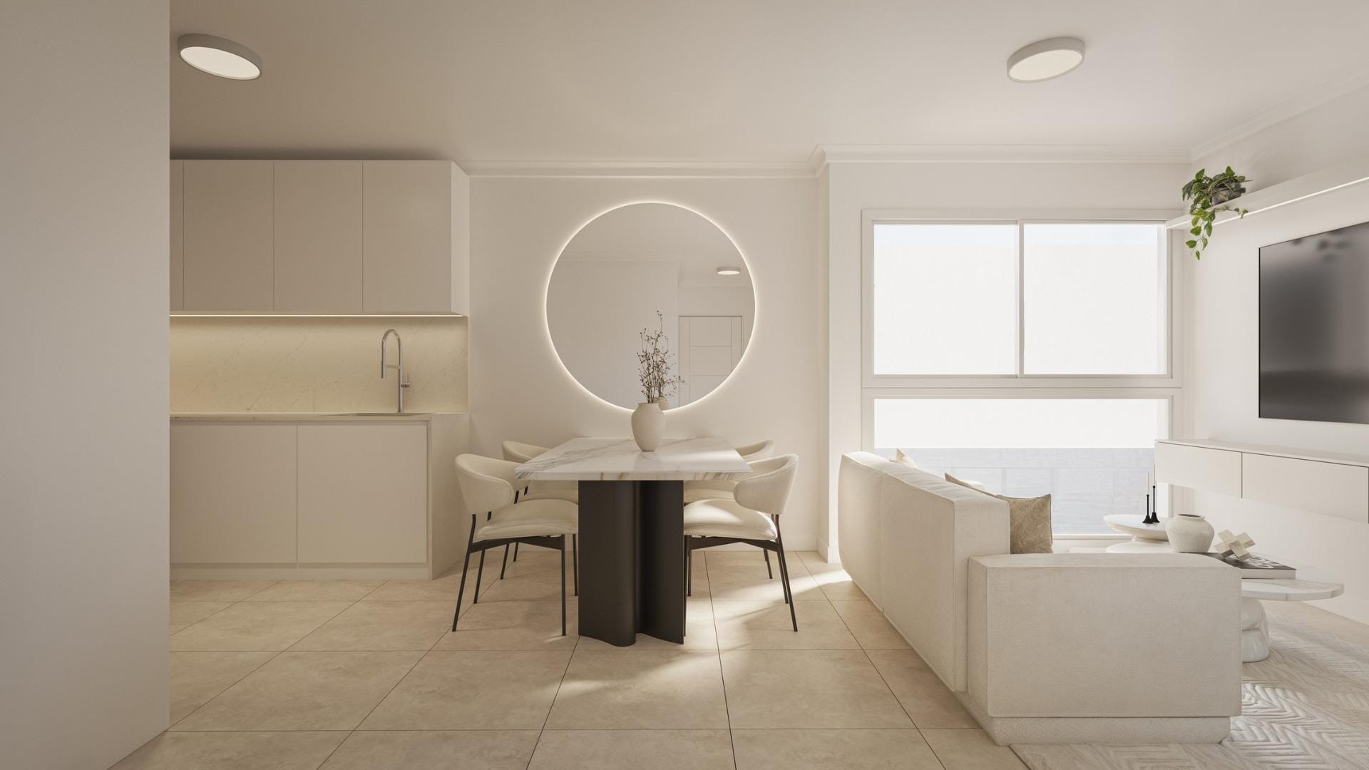 New-Build-Studios-and-Apartments-in-Central-Torrevieja-Near-the-Beach-7 A studio living and dining area beside a large window in Torrevieja, Alicante