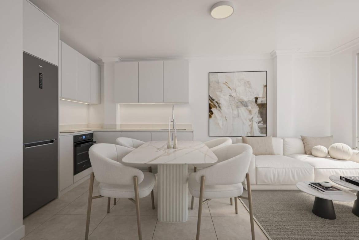 An open-plan living, dining and kitchen area beside a terrace in Torrevieja, Alicante