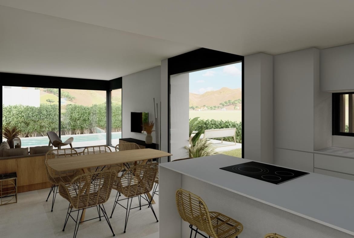 Open-plan kitchen and dining area with large sliding doors to the pool terrace in La Manga Club, Murcia