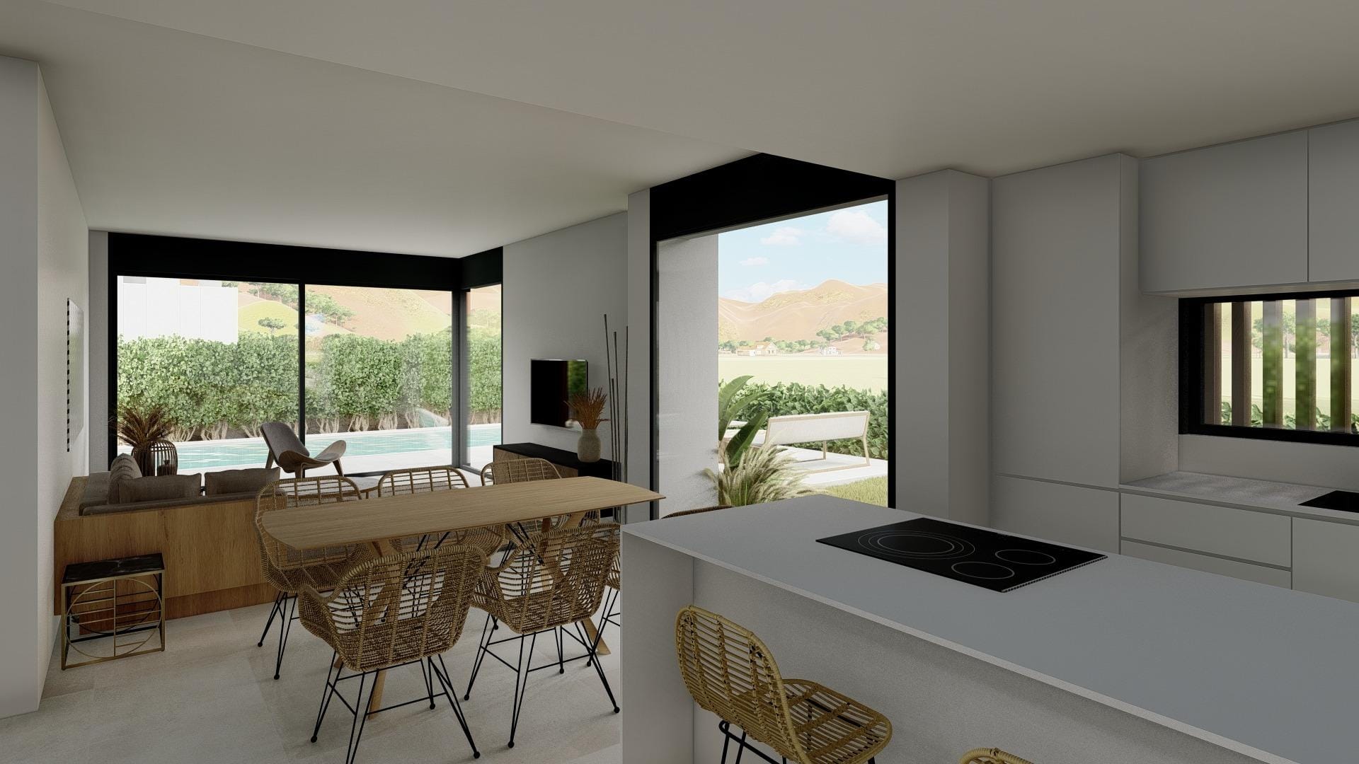 Open-plan kitchen and dining area with large sliding doors to the pool terrace in La Manga Club, Murcia