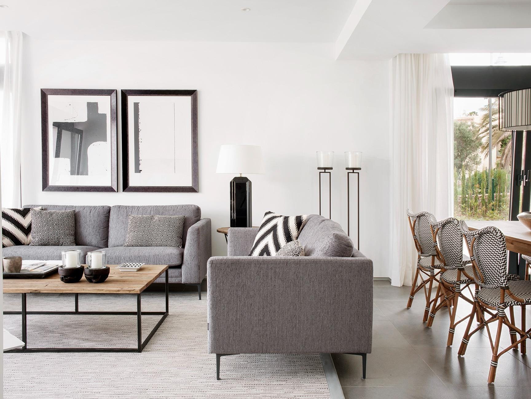 New-Build-Villas-for-Sale-at-La-Manga-Club-–-Luxury-Living-in-a-Prestigious-Resort-3 Bright open-plan living and dining area with grey sofas and neutral styling in La Manga Club, Murcia