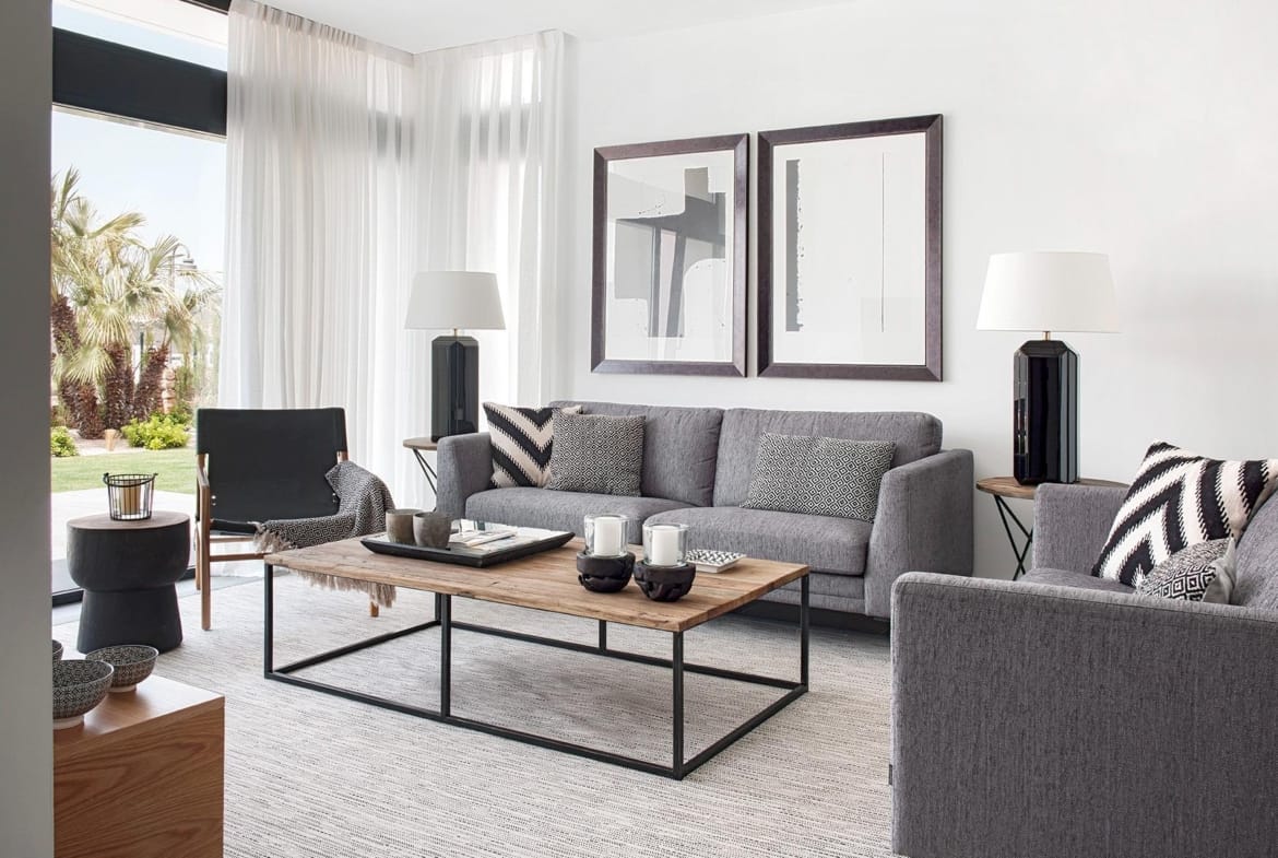 Contemporary living room with corner glazing and garden outlook in La Manga Club, Murcia