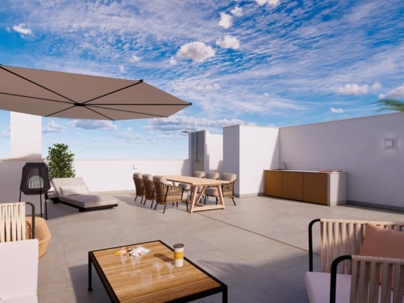Rooftop terrace with an outdoor kitchen, dining table and shaded seating in Torre de la Horadada, Alicante