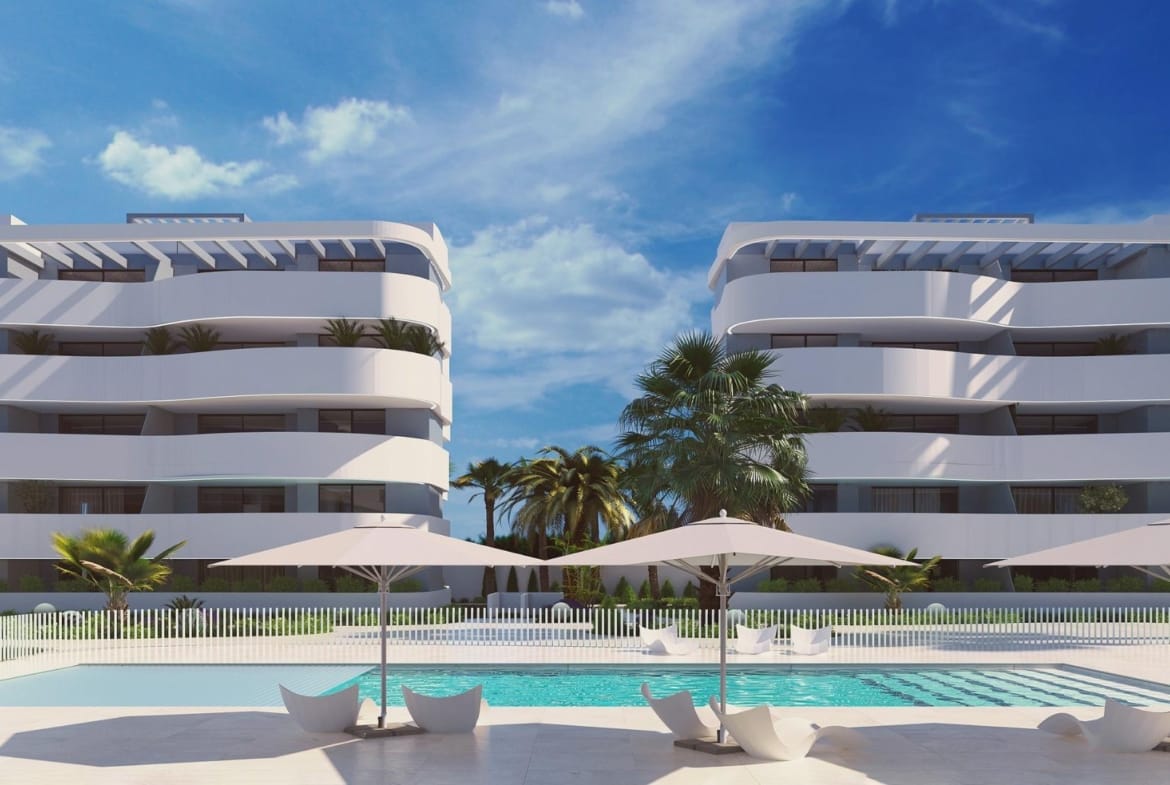 Rendering of a communal pool with sun loungers and curved apartment facades in El Raso, Guardamar del Segura, Alicante