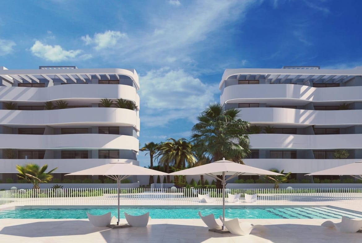 Daytime rendering of a communal pool, sun loungers and palm trees in El Raso, Guardamar del Segura, Alicante
