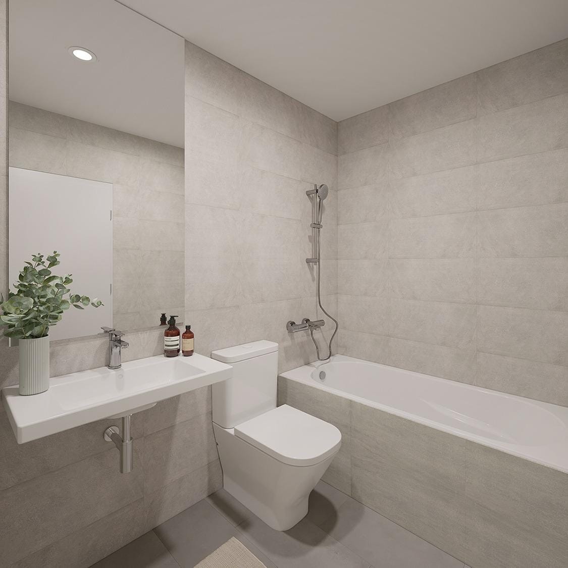 Modern bathroom with bathtub in a San Agustín penthouse, Alicante