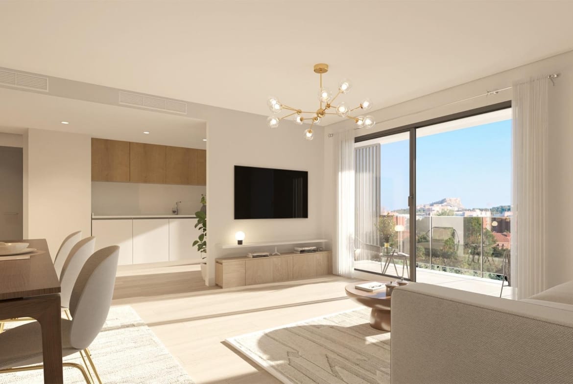 Bright living room and open kitchen in a San Agustín penthouse, Alicante