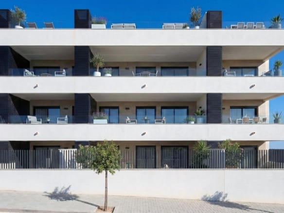 Architectural rendering of a white apartment building with broad terraces and dark privacy screens in Benijófar, Alicante