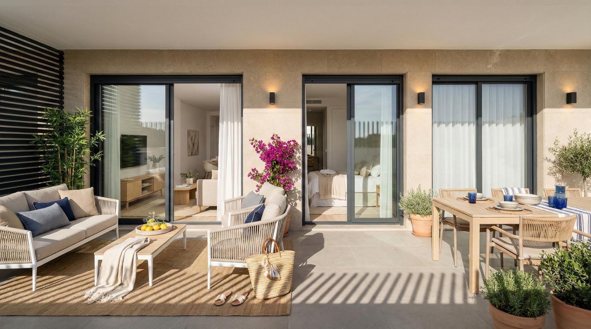 Terrace rendering with a dining table, lounge seating and sliding glass doors in Benijófar, Alicante