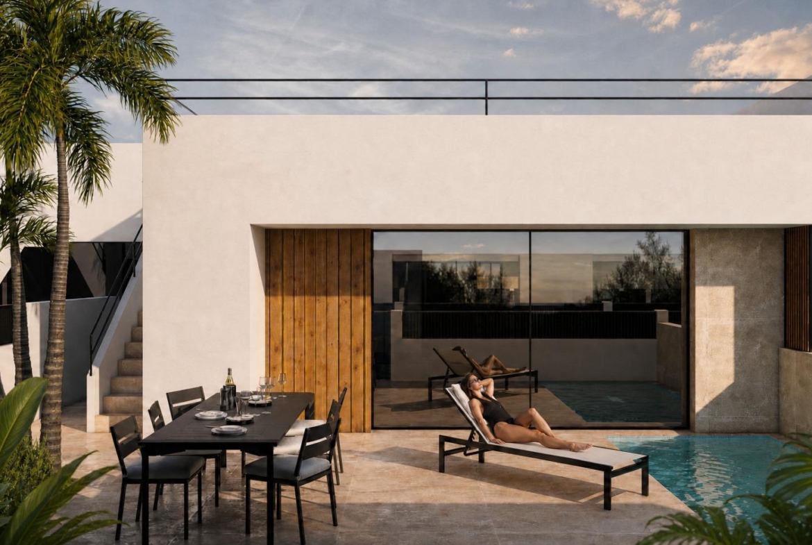 Garden terrace beside a 3 bedroom townhouse with optional pool in Condado de Alhama Golf Resort