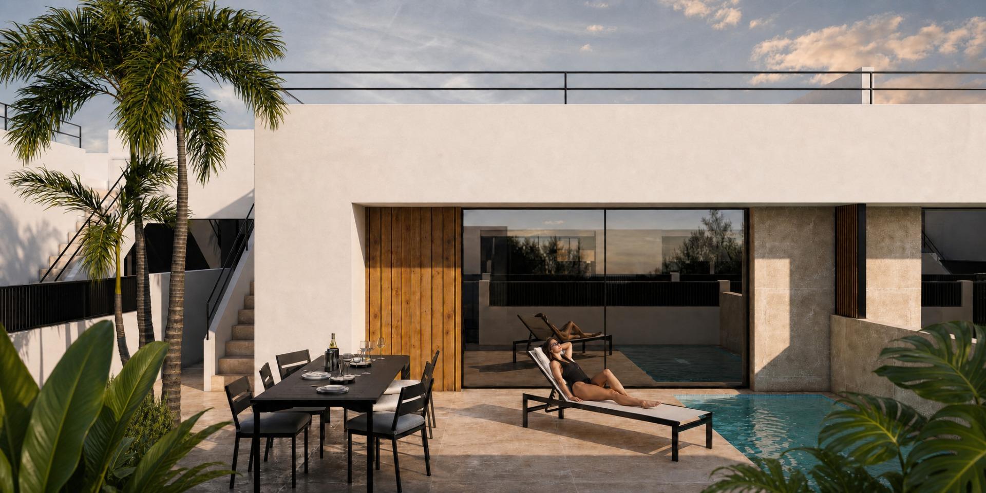 Garden terrace beside a 3 bedroom townhouse with optional pool in Condado de Alhama Golf Resort