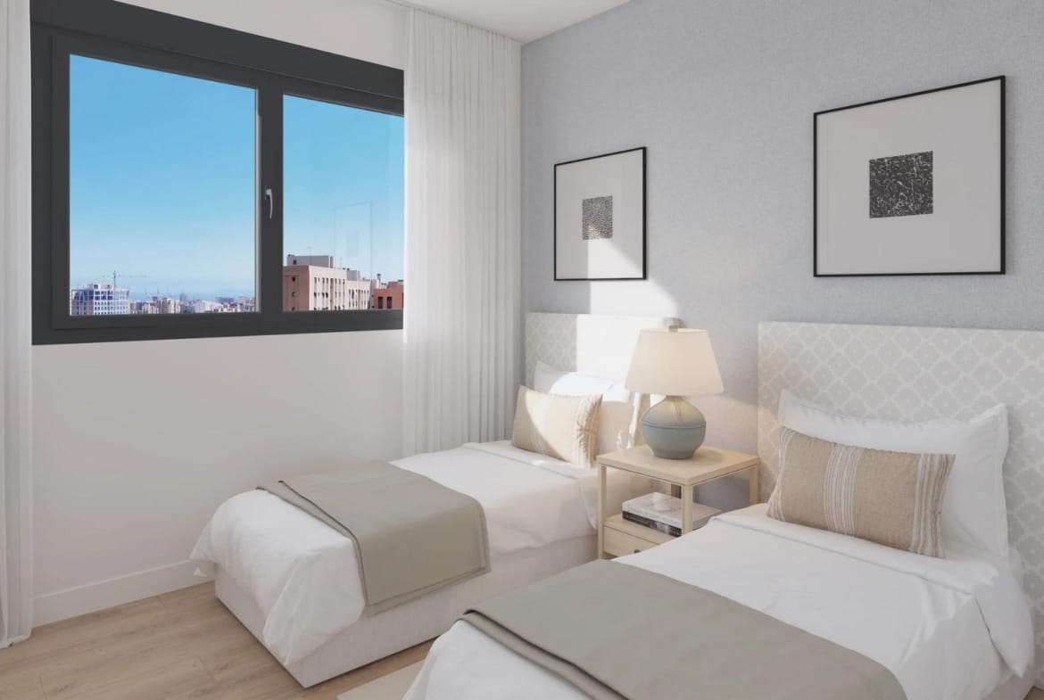 Twin bedroom with grey feature wall and city outlook in San Agustín, Alicante