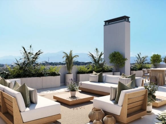 Rooftop terrace with outdoor sofas, dining furniture and mountain backdrop in San Agustín, Alicante