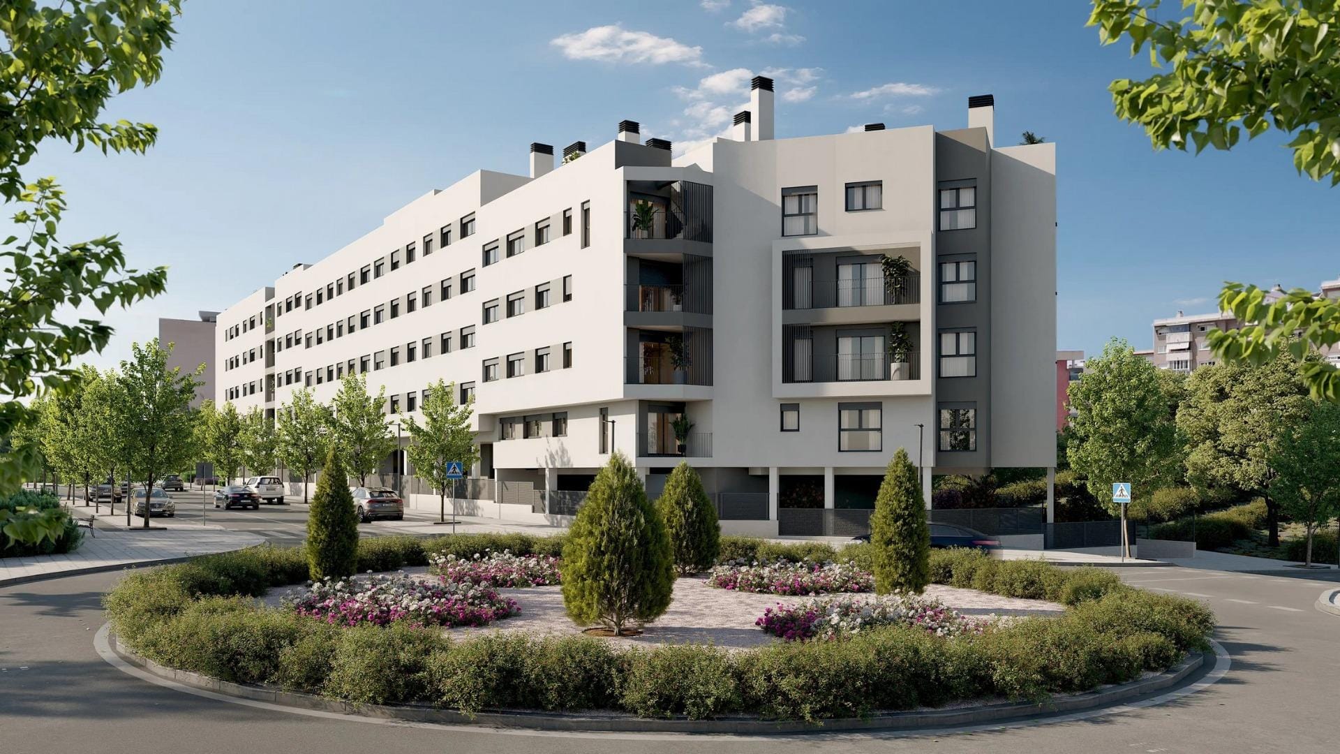 Newly-built-residential-development-in-Alicante-with-open-views-of-the-city-2 Apartment building beside a landscaped roundabout in San Agustín, Alicante