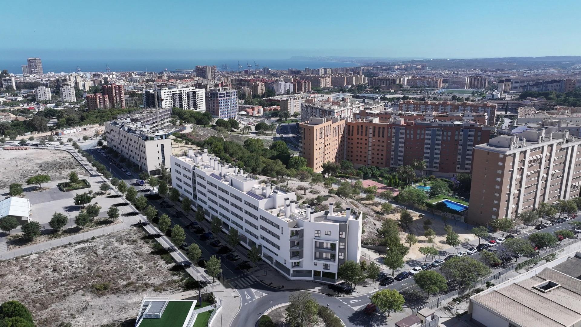 Newly-built-residential-development-in-Alicante-with-open-views-of-the-city-5 Aerial view of the apartment development and Alicante coastline from San Agustín, Alicante